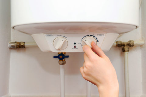 Adjusting water heater temperature